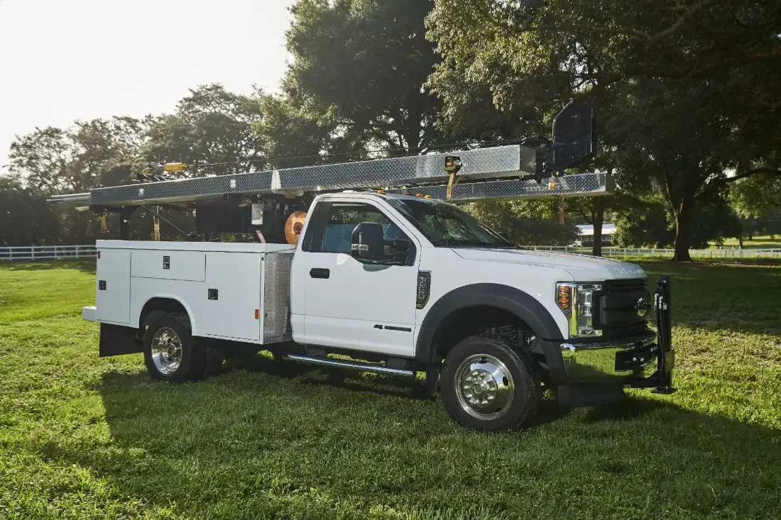 Pump Repair Services rig truck set up on a well