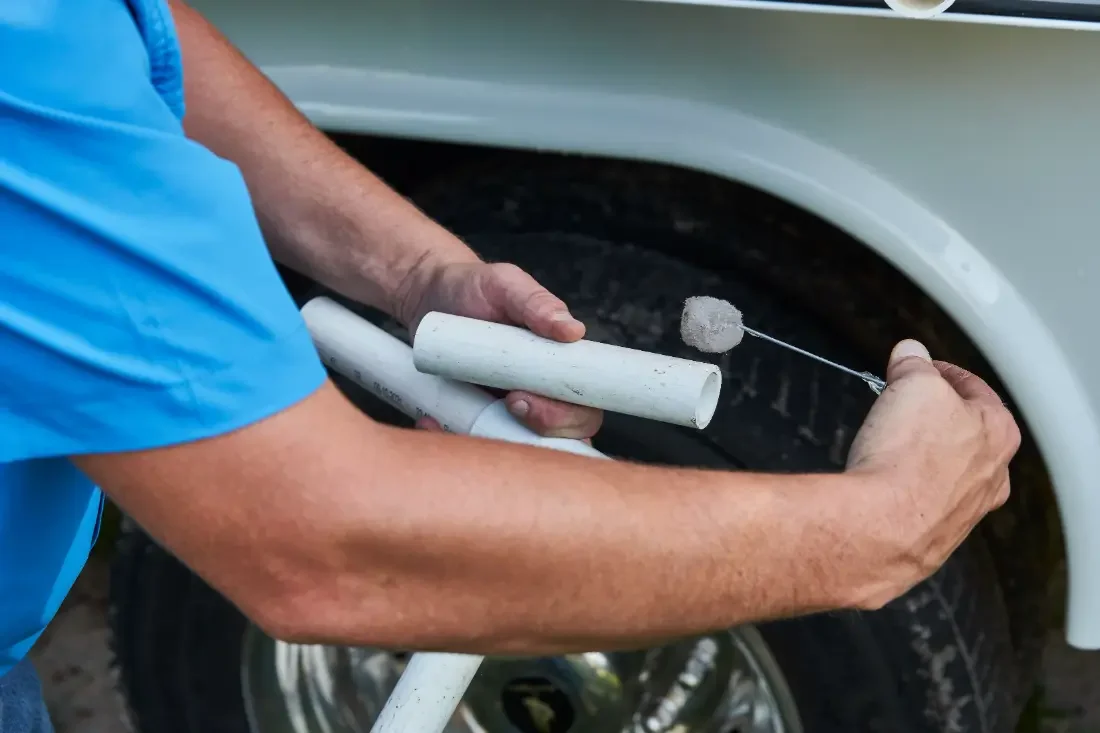 Preparing a PVC joint on a Central Florida well repair
