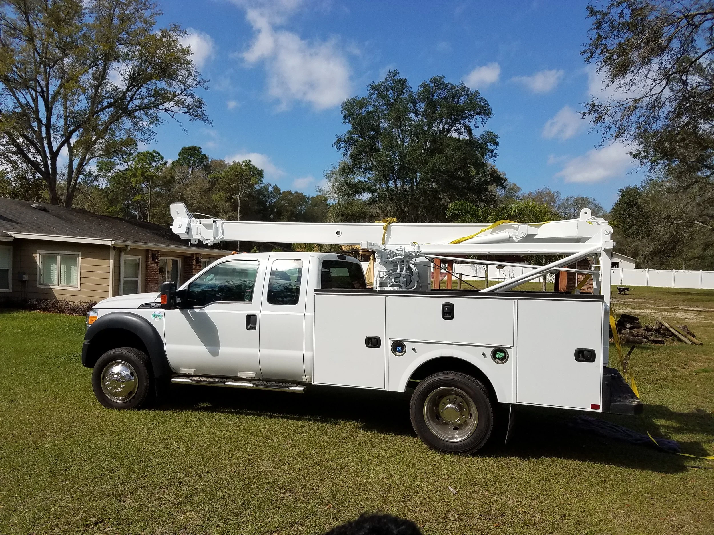 Service truck parked at a customer home - Pump Repair Services, Orlando FL