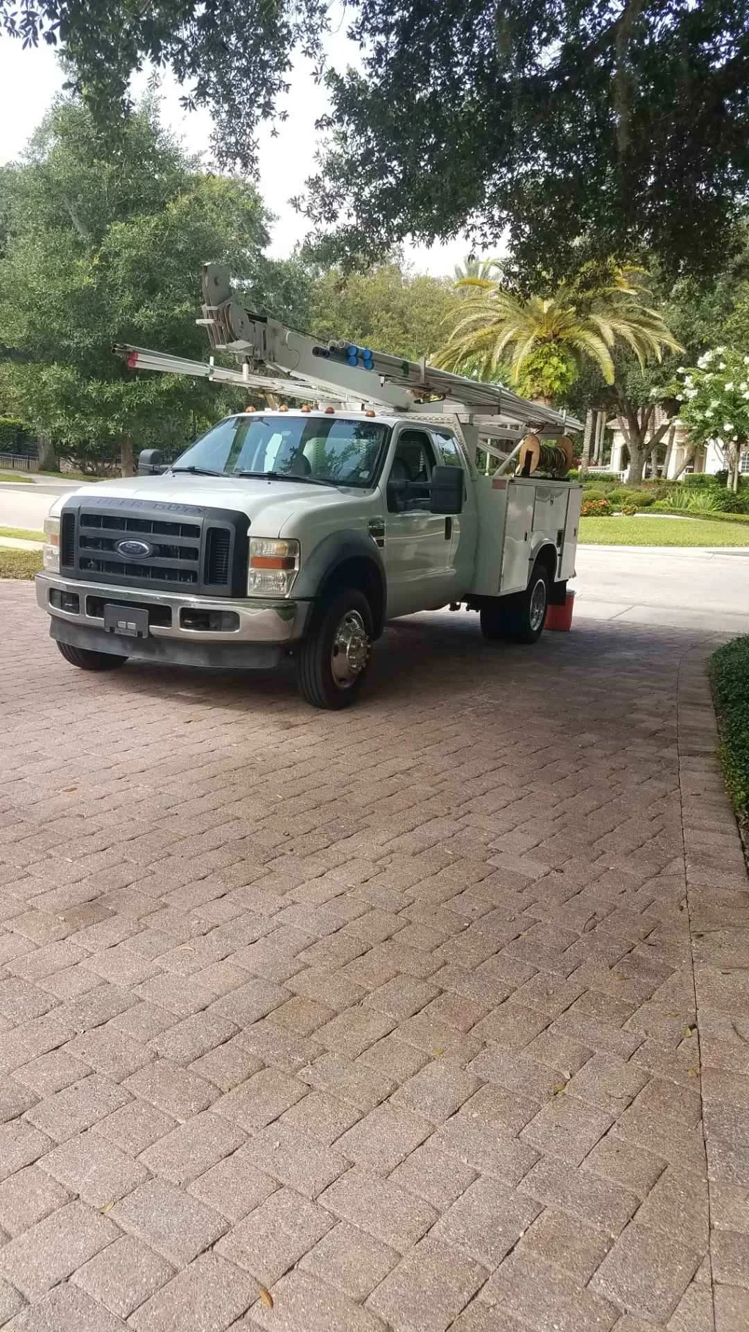 Service truck on a rural driveway - Pump Repair Services, Orlando FL
