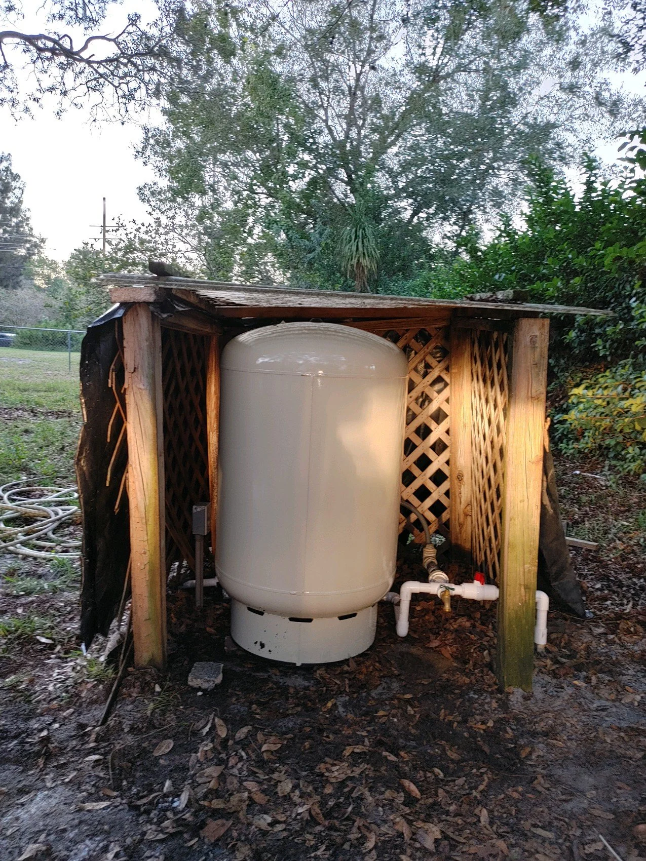 Pressure tank in a well house enclosure - Pump Repair Services, Orlando FL