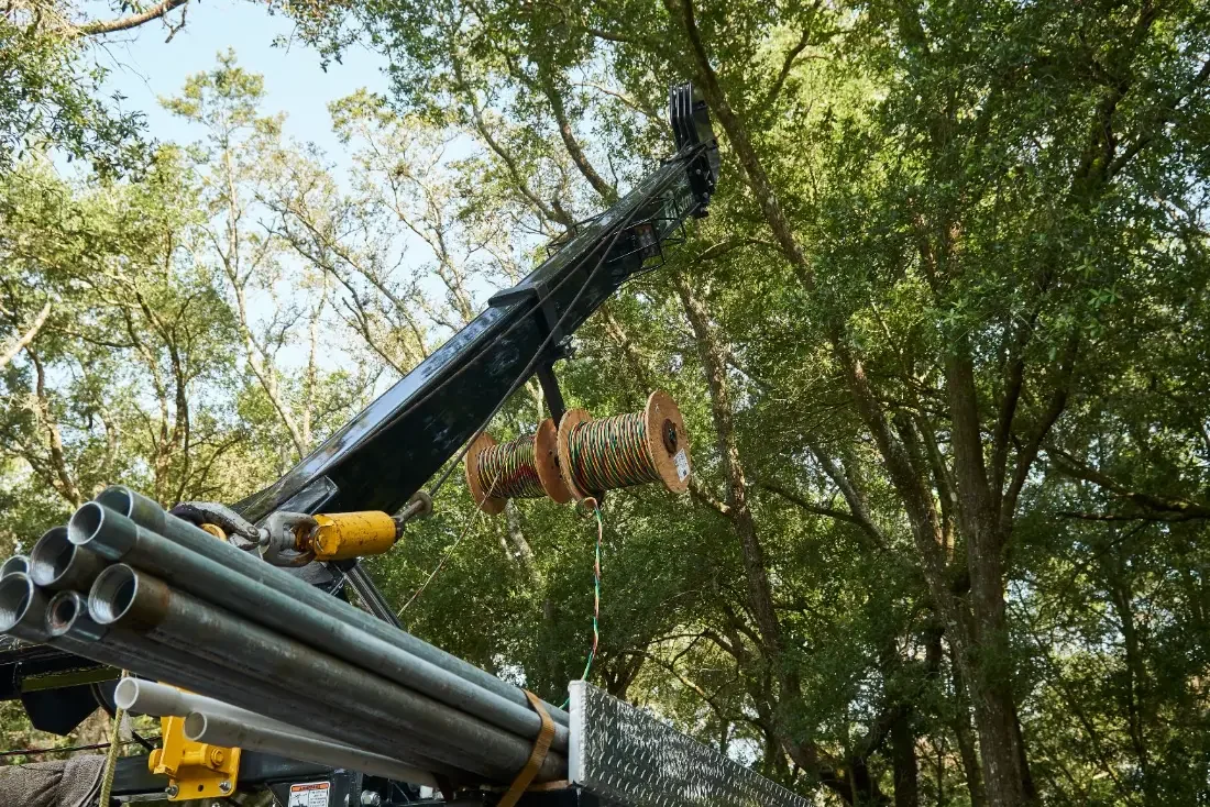 Hoist hook and drop pipe rigged on the Pulstar boom