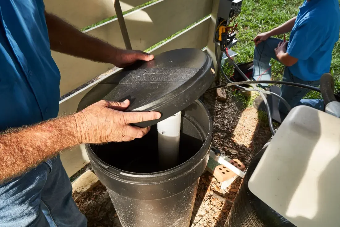 Servicing a pressure tank and control panel on a Central Florida well system