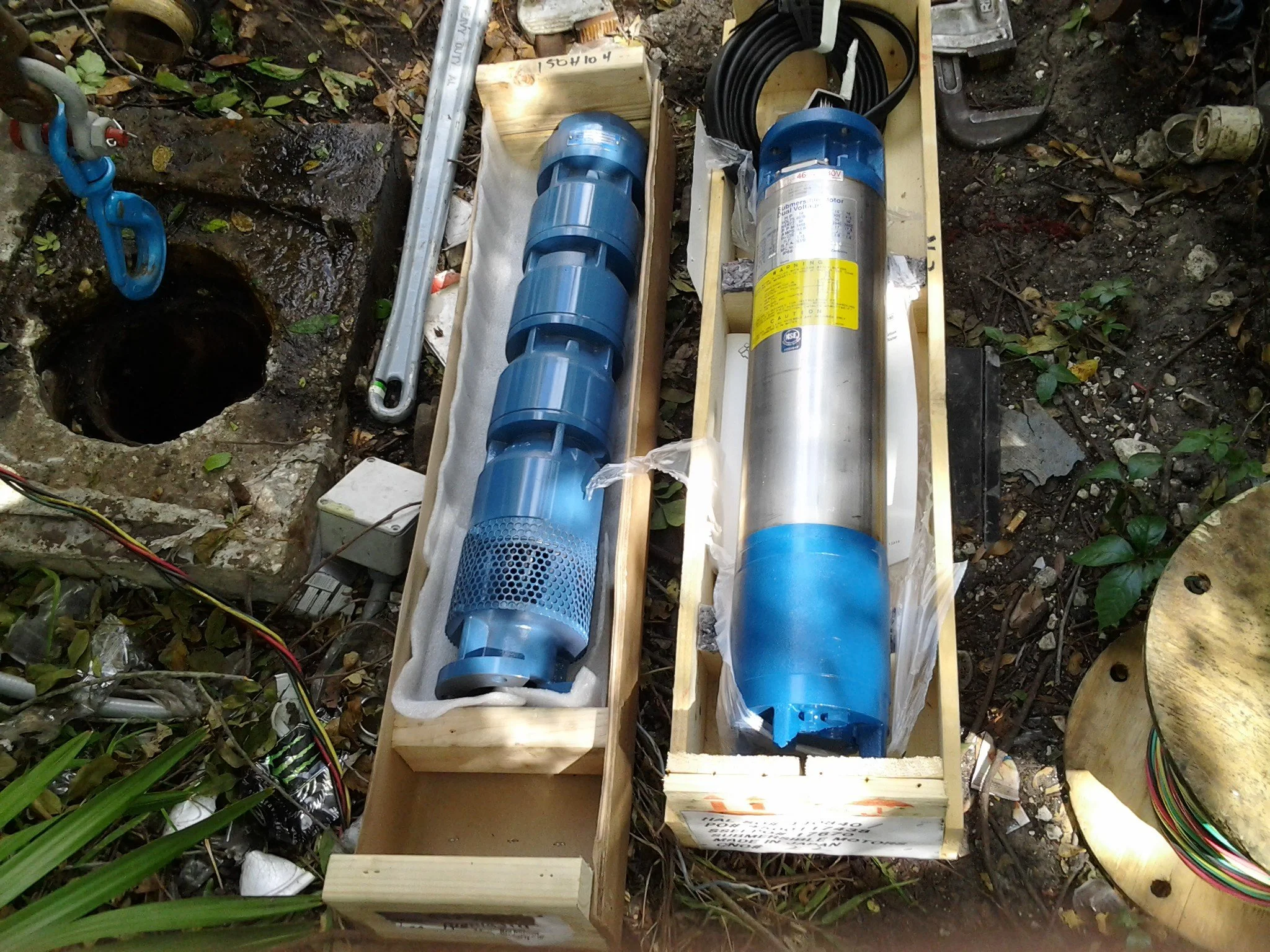 Submersible pump beside an open well head - Pump Repair Services, Orlando FL