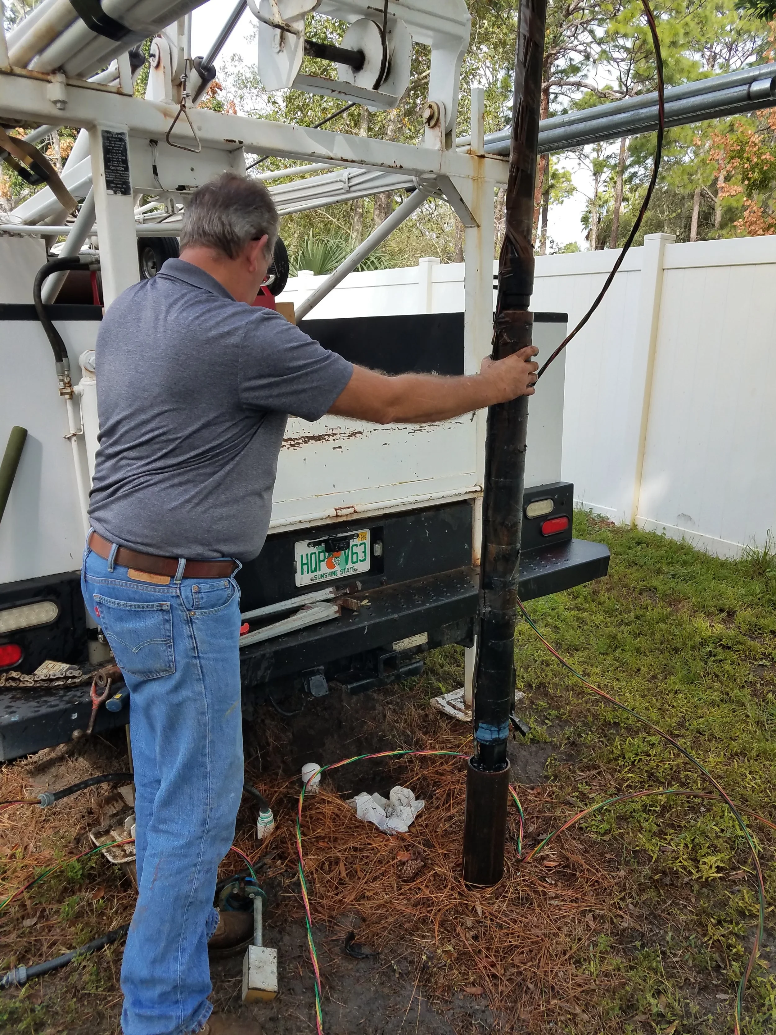 Steven servicing equipment on a job - Pump Repair Services, Orlando FL