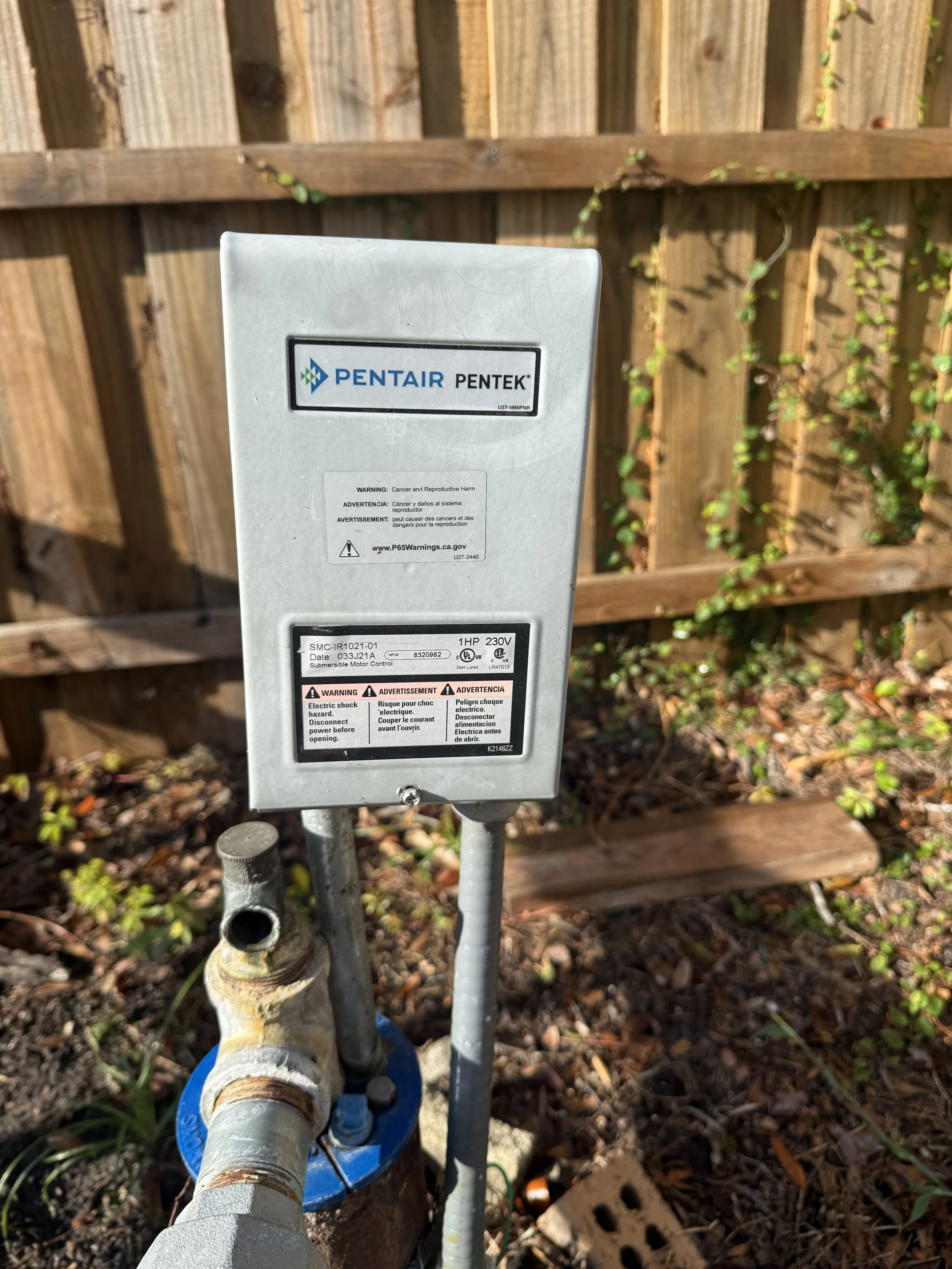 Pentair pump control box mounted on a post - Pump Repair Services, Orlando FL