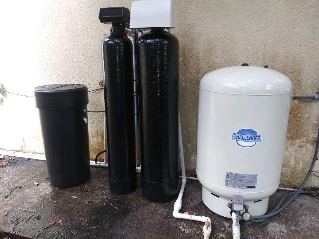 Carbon tanks and pressure tank on a slab - Pump Repair Services, Orlando FL