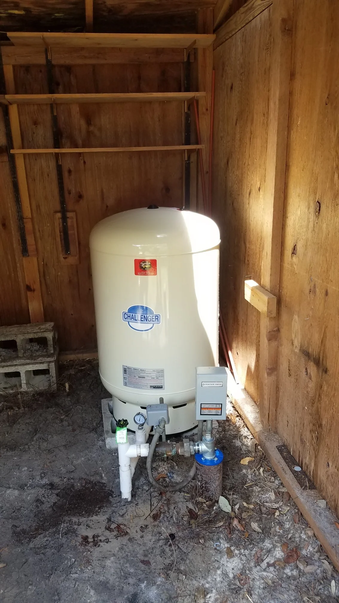 Transfer pump and tank in a shed - Pump Repair Services, Orlando FL