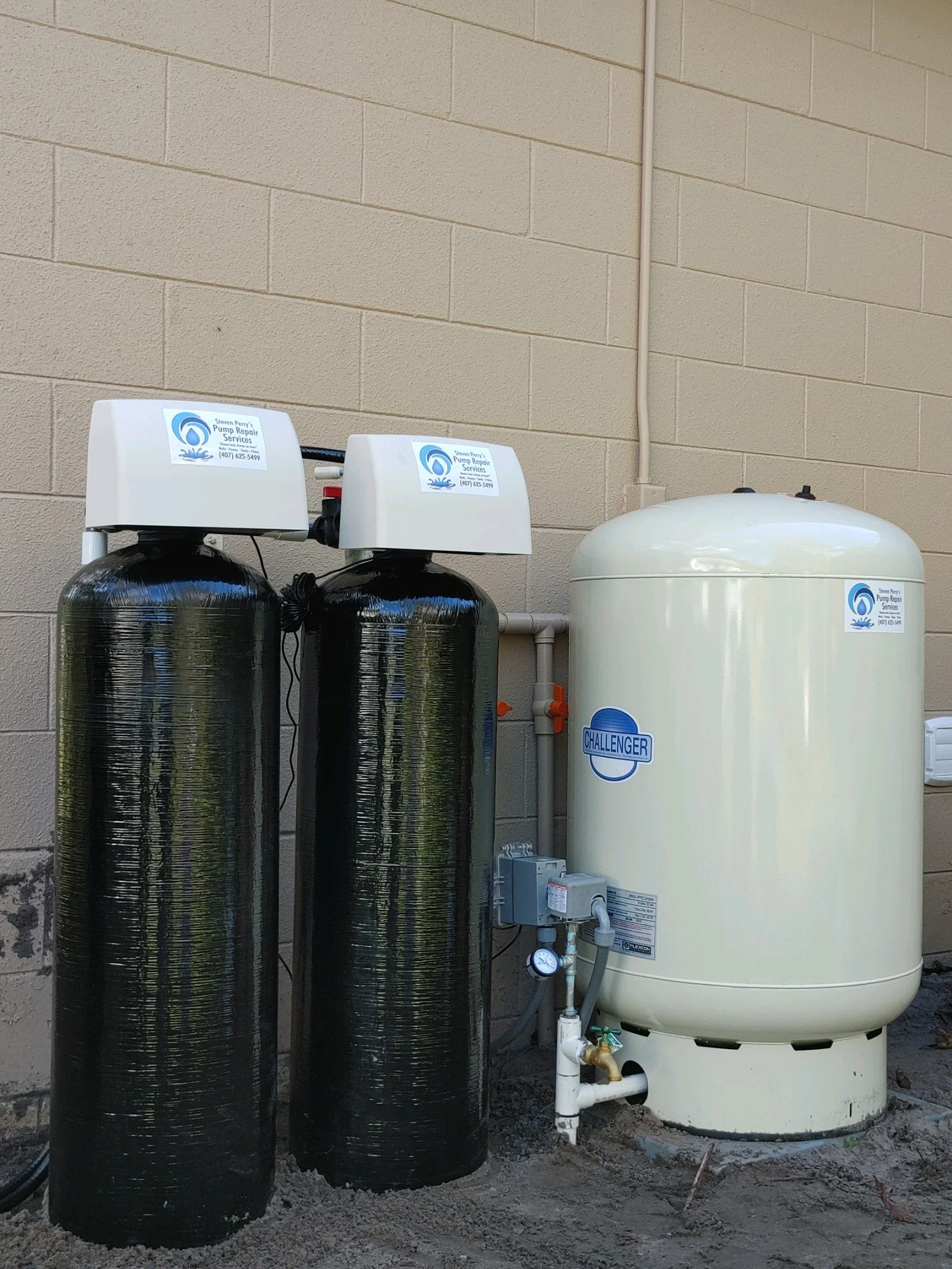 Twin treatment tanks and pressure tank - Pump Repair Services, Orlando FL