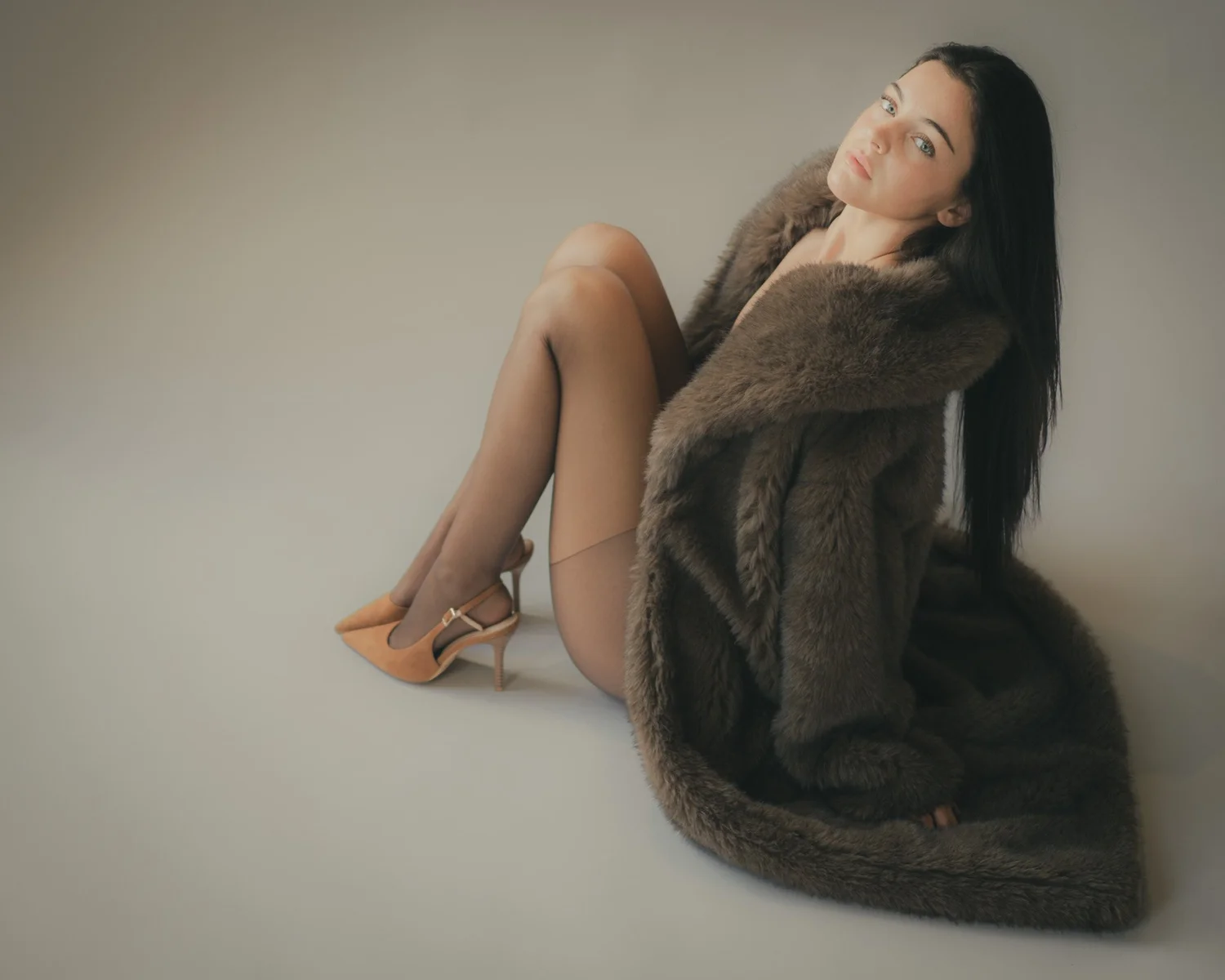 LILY × MINT — Seated brown coat fashion portrait, photographed from above, photographed by CAMR Visuals.
