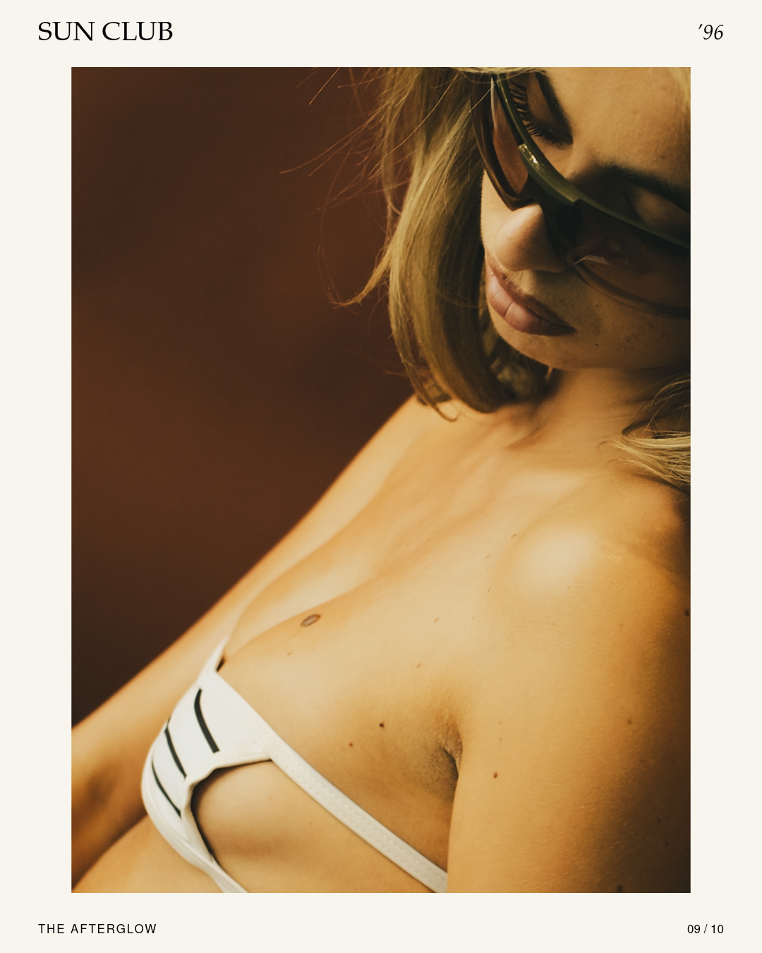 Sun Club 96 The Afterglow: close swimwear portrait with sunglasses.