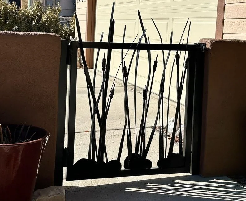 Custom iron gate with reed detail