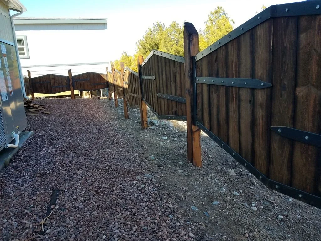 Custom wood fence with steel trim detail
