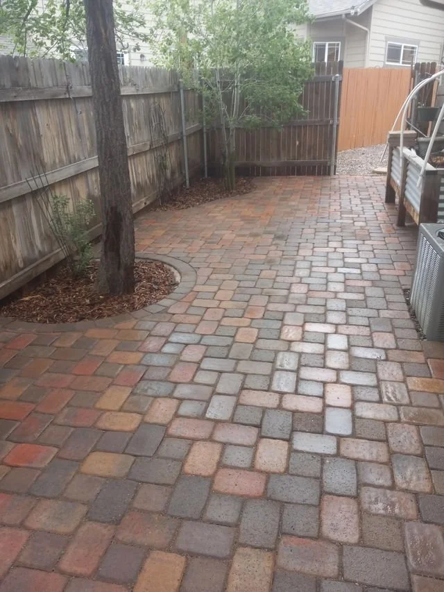 Multicolor paver patio installation