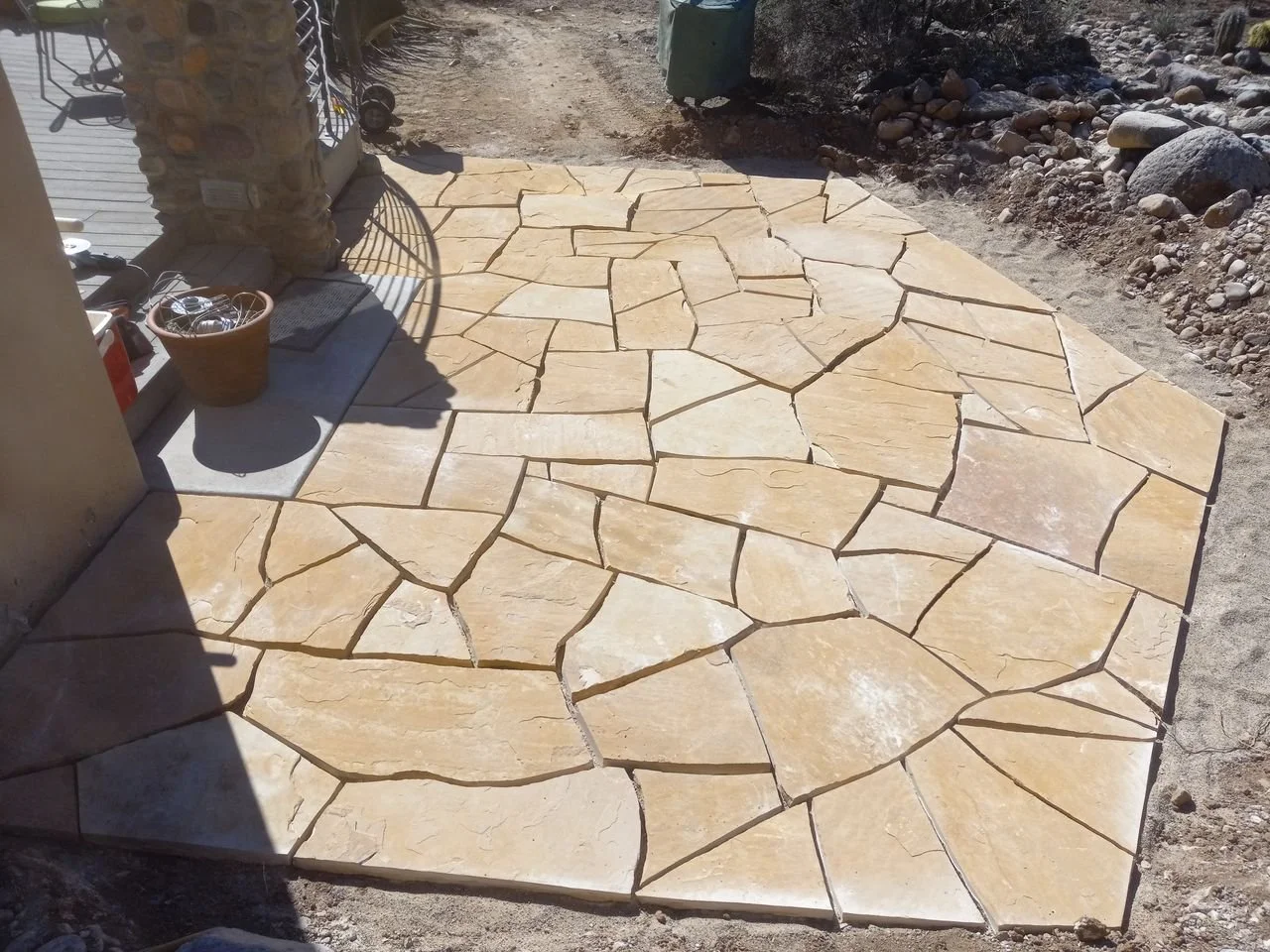 Flagstone patio installation