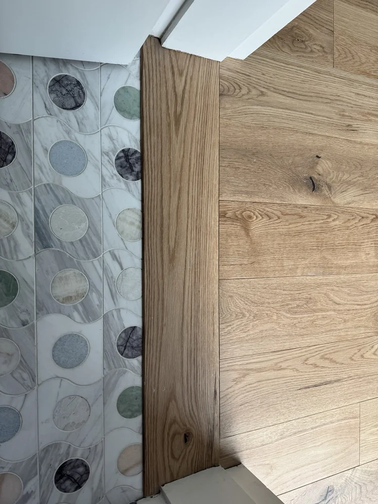 Mosaic floors and vanity details — project view.
