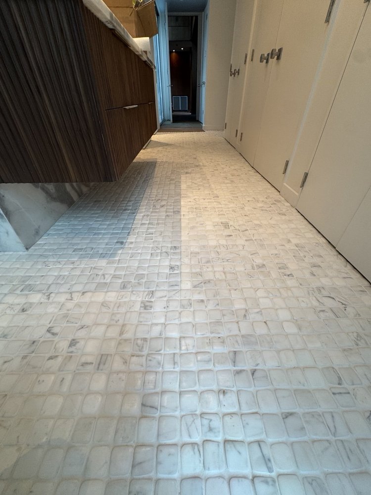 Mosaic floors and vanity details — project view.