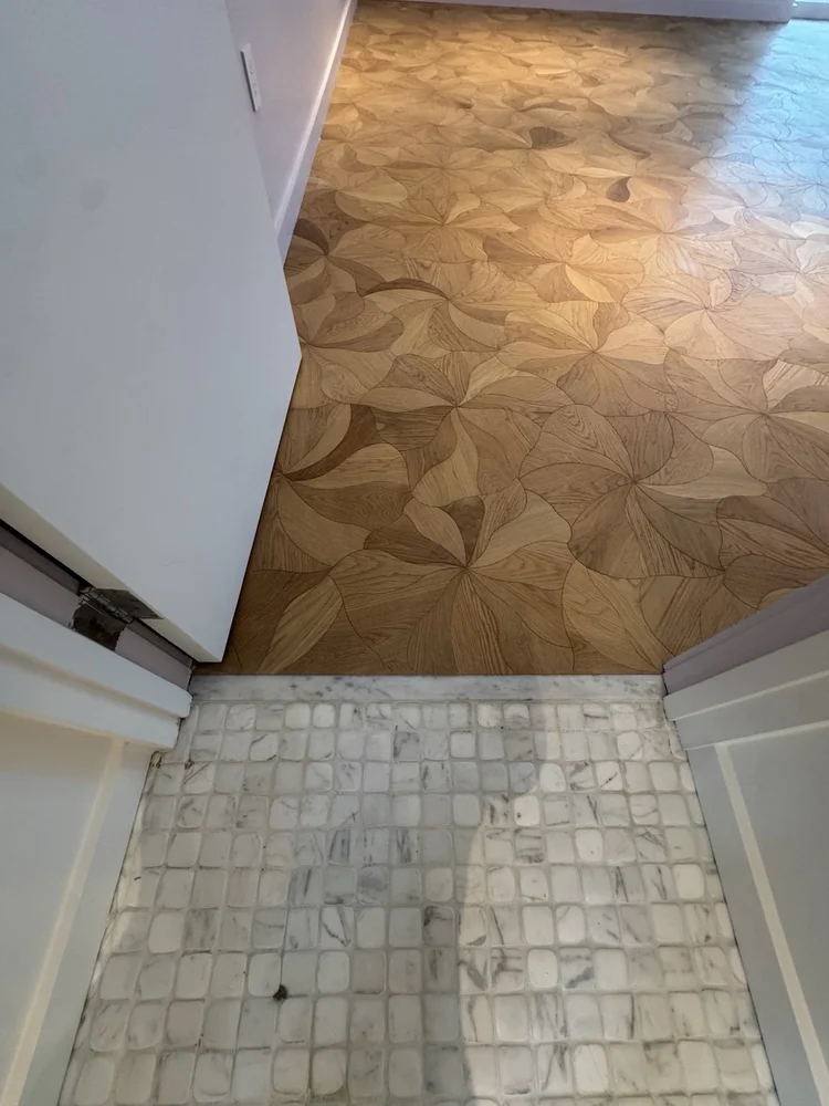 Mosaic floors and vanity details — project view.