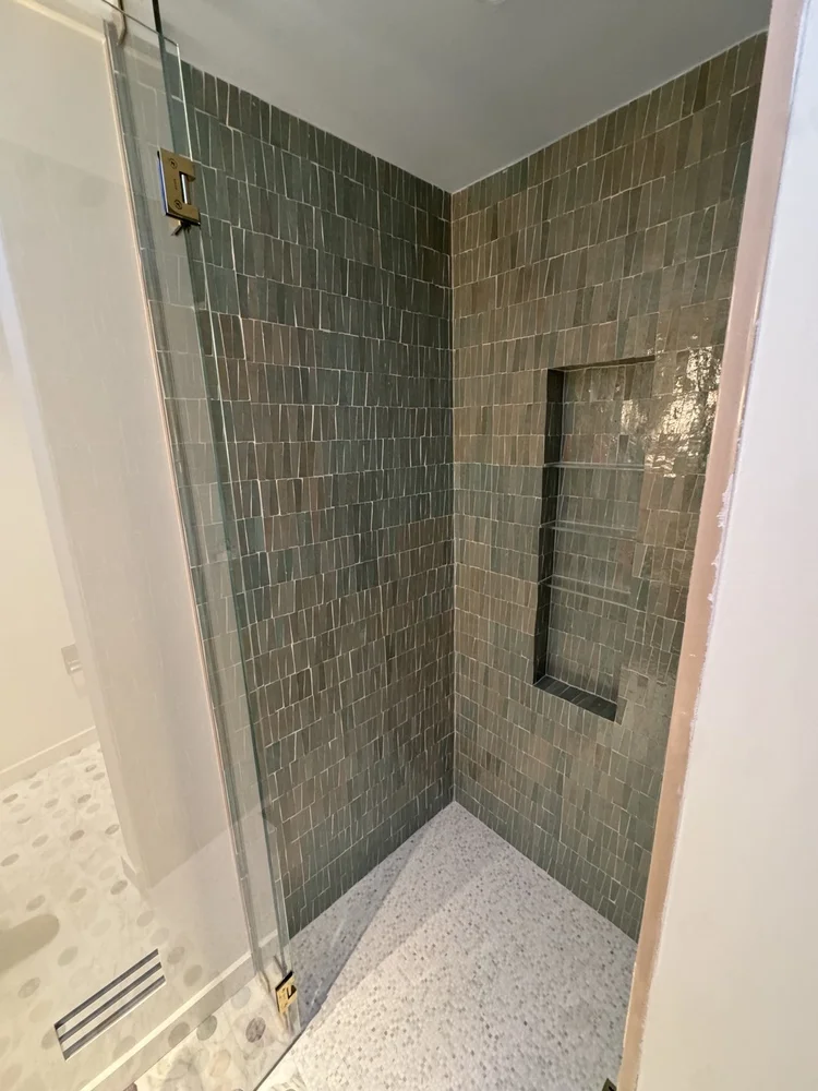 Green tile shower installation — project view.
