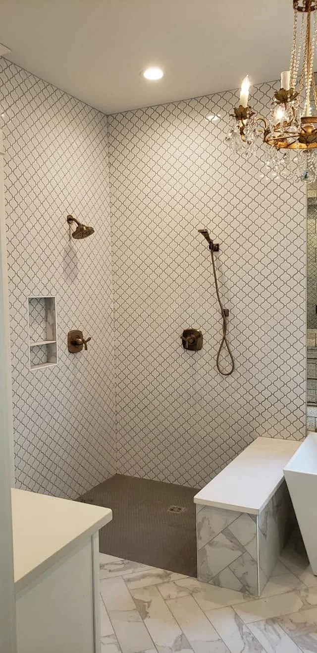Warm brass bathroom — EC Construction project photograph.