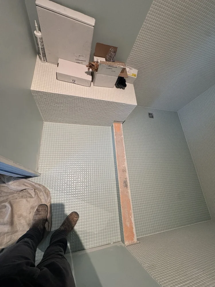 Green and white mosaic installation — project view.