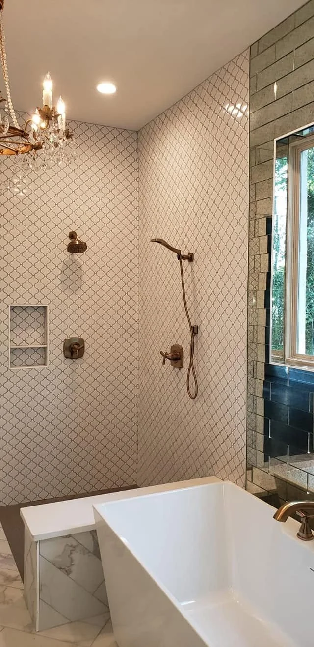 Warm brass bathroom — EC Construction project photograph.