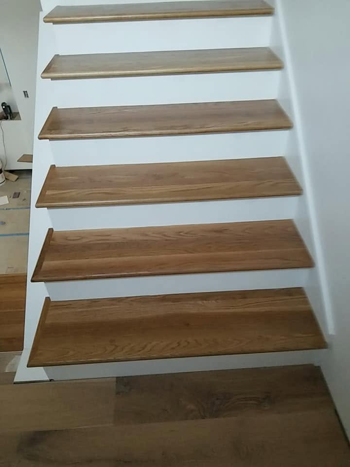 Custom stair treads — EC Construction project photograph.