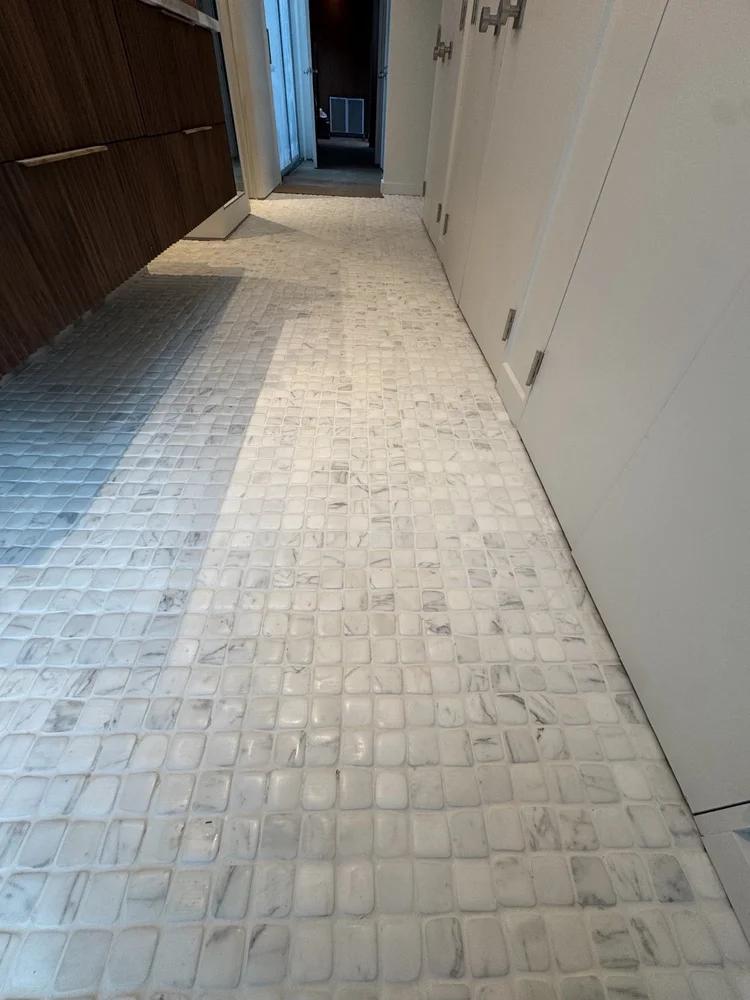 Mosaic floors and vanity details — project view.