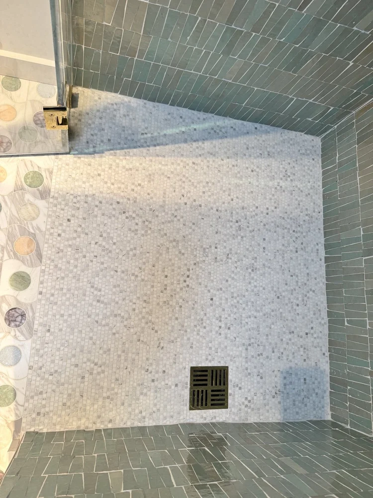 Green tile shower installation — project view.