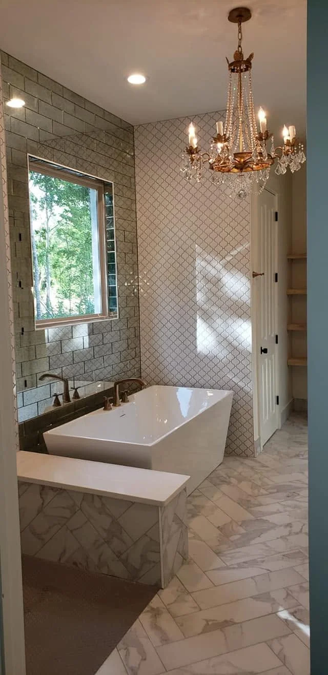 Warm brass bathroom — EC Construction project photograph.