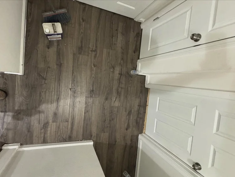 Light gray flooring — EC Construction project photograph.