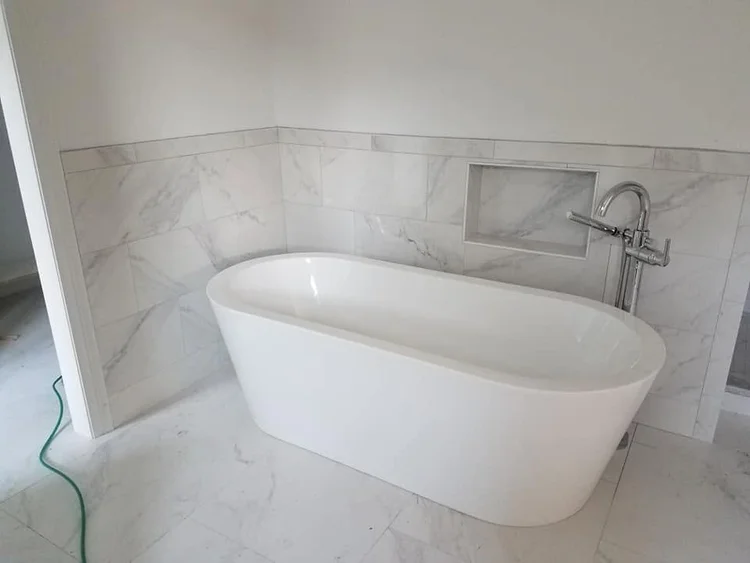 Tub and shower tilework — EC Construction project photograph.