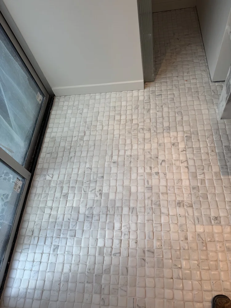 Mosaic floors and vanity details — project view.