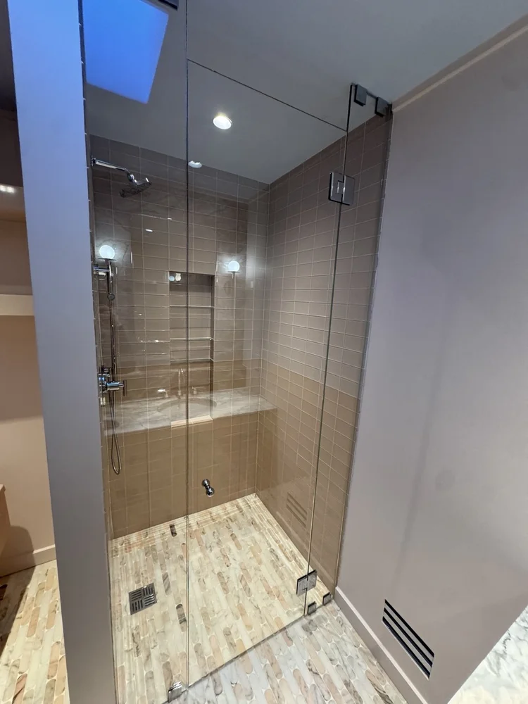 Taupe tile shower — project view.