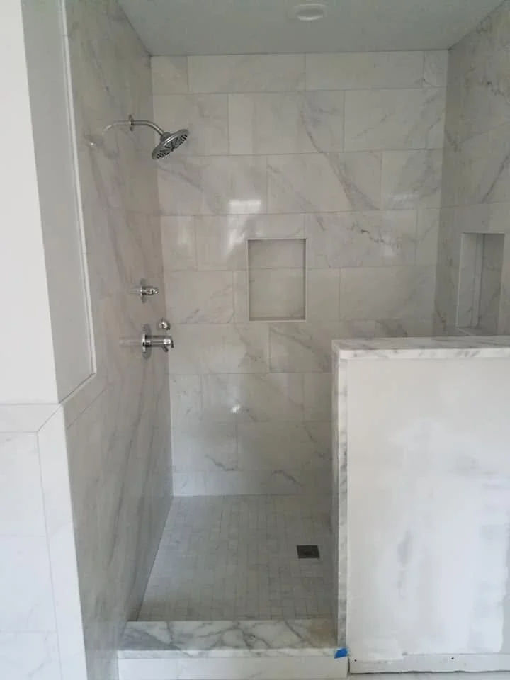 Tub and shower tilework — EC Construction project photograph.
