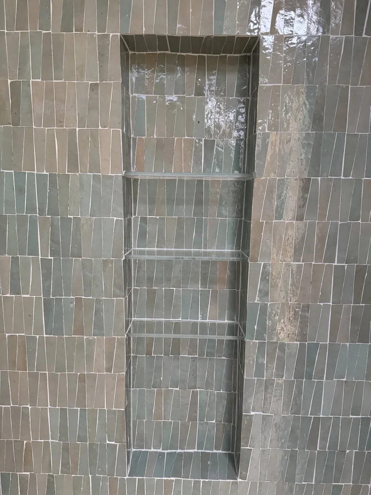 Green tile shower installation — project view.