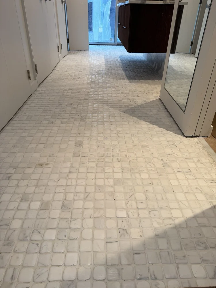 Mosaic floors and vanity details — project view.