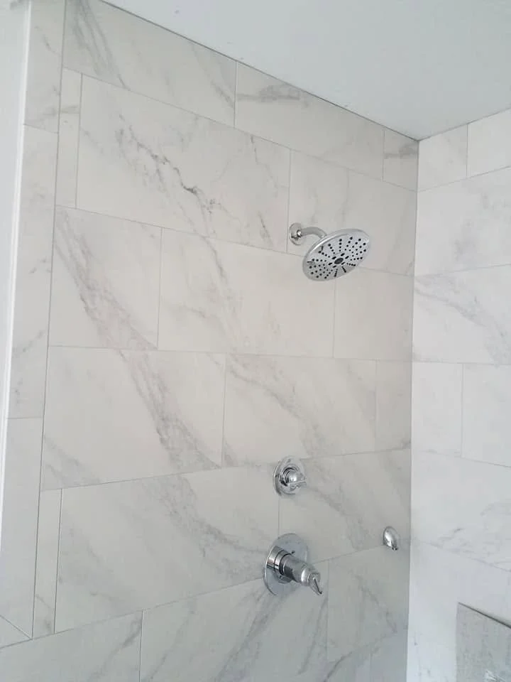 Tub and shower tilework — EC Construction project photograph.
