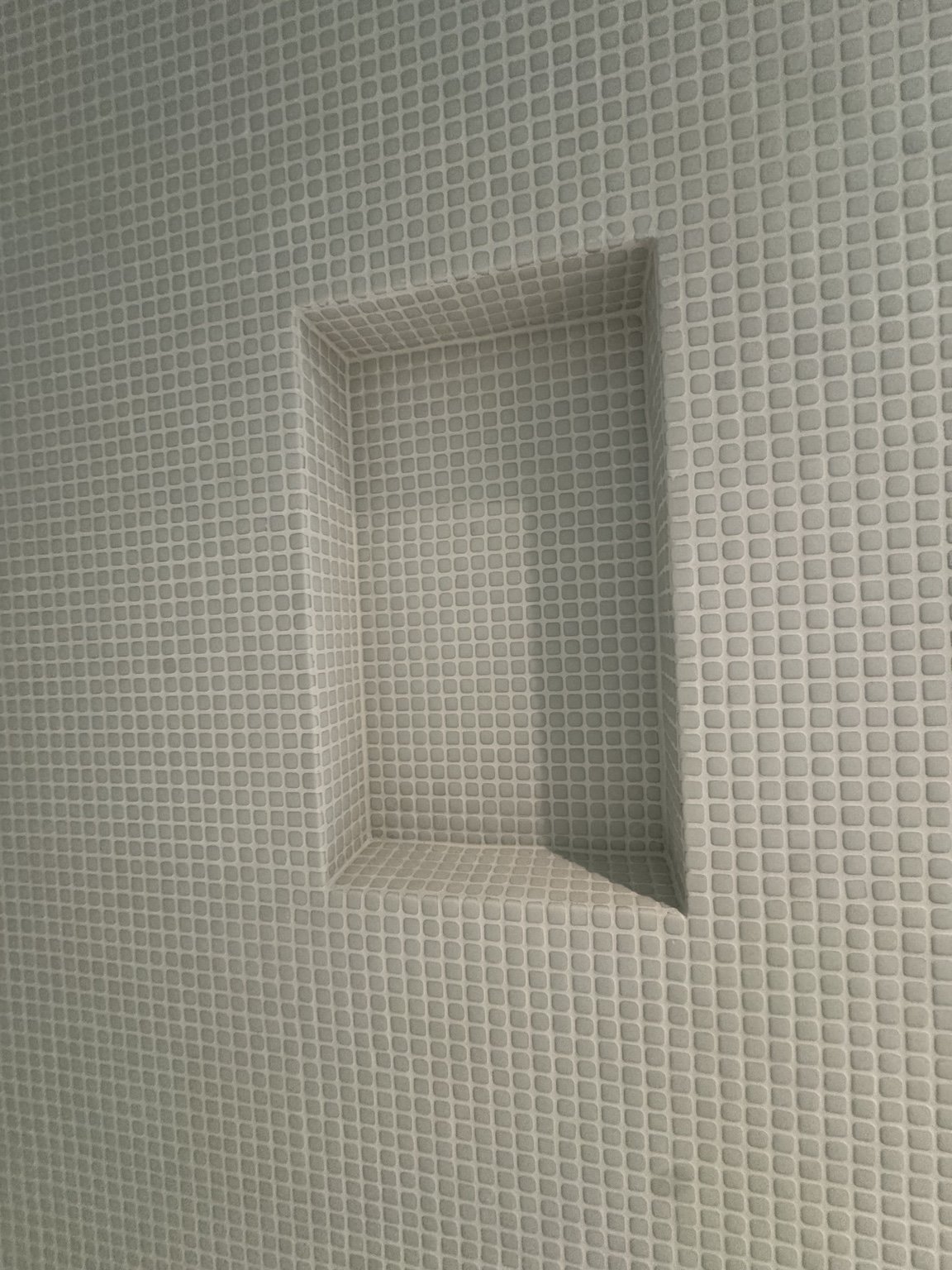 Green and white mosaic installation — project view.