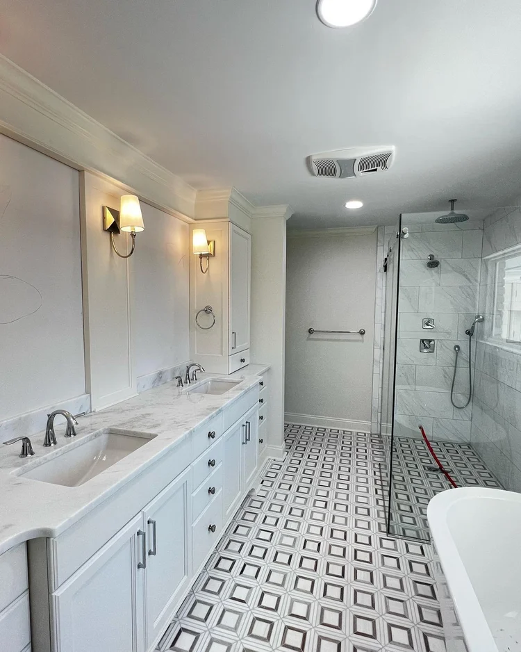 Marble shower and vanity — EC Construction project photograph.