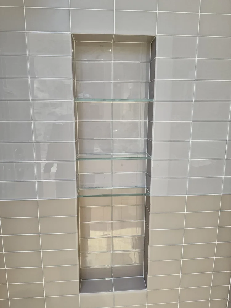 Taupe tile shower — project view.