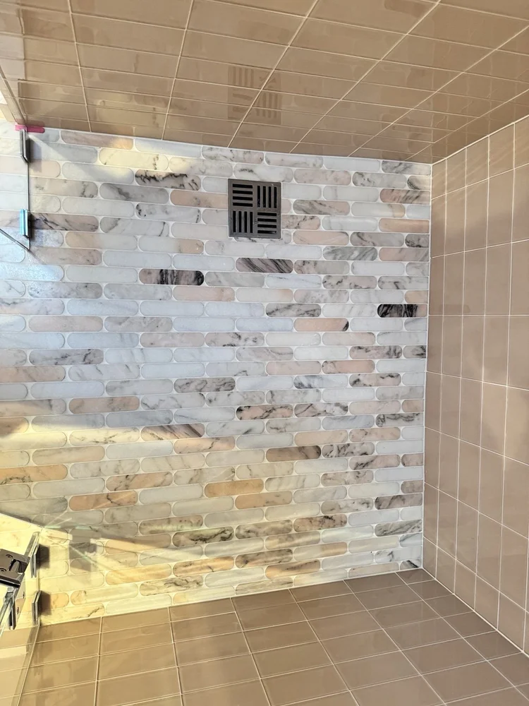 Taupe tile shower — project view.