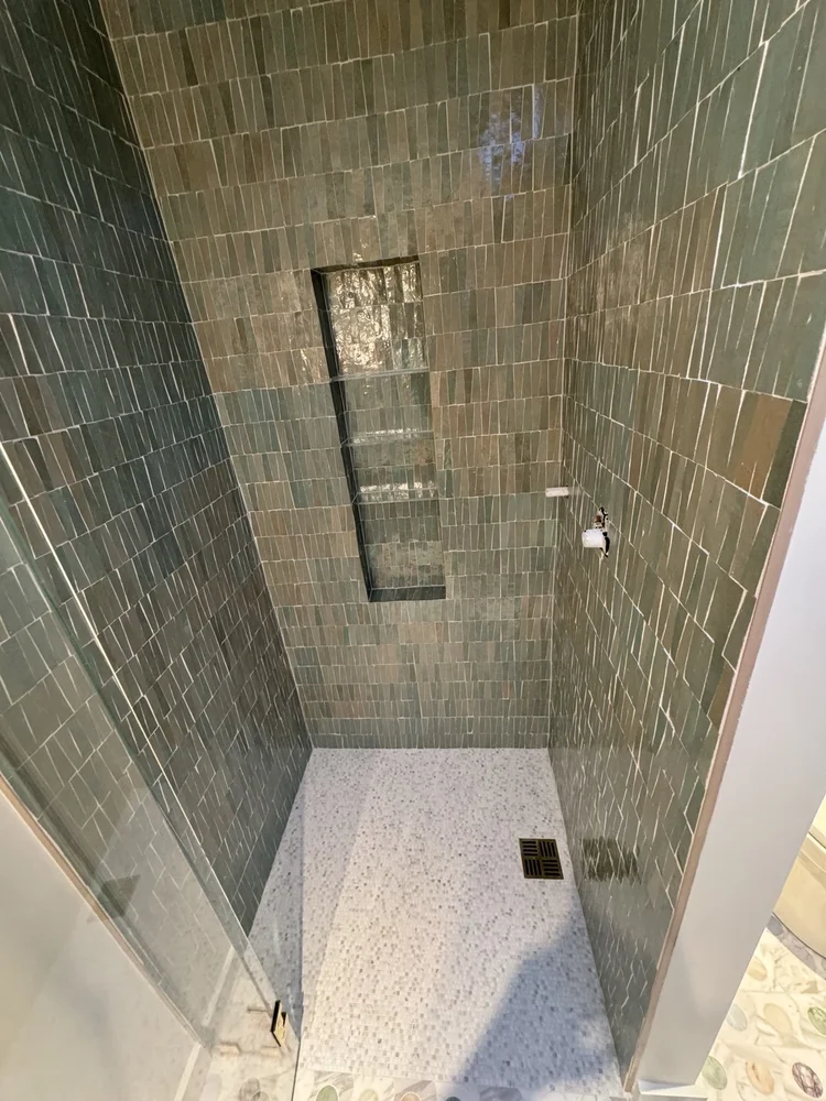 Green tile shower installation — project view.