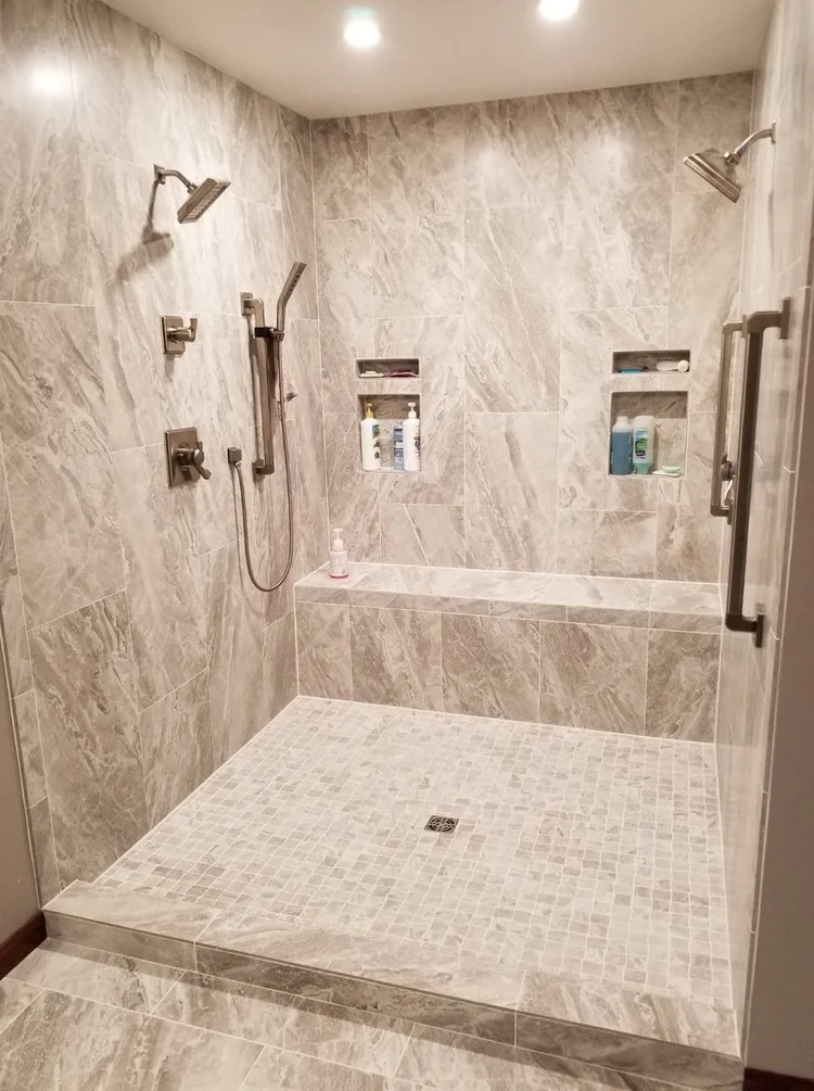 Cream marble shower — EC Construction project photograph.