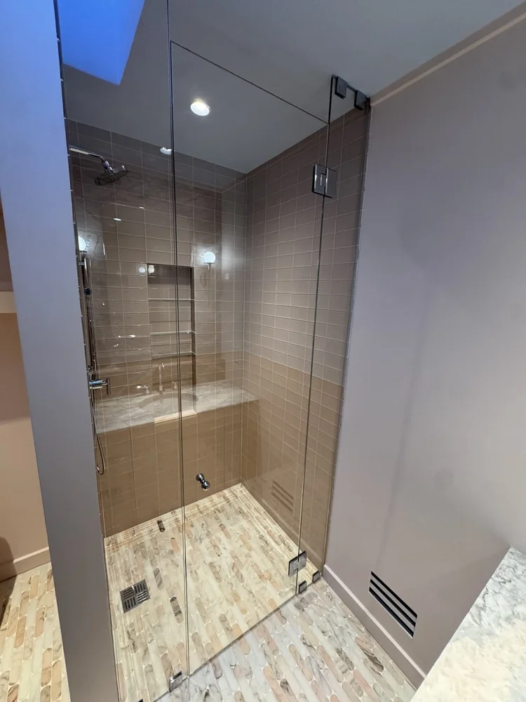 Taupe tile shower — project view.