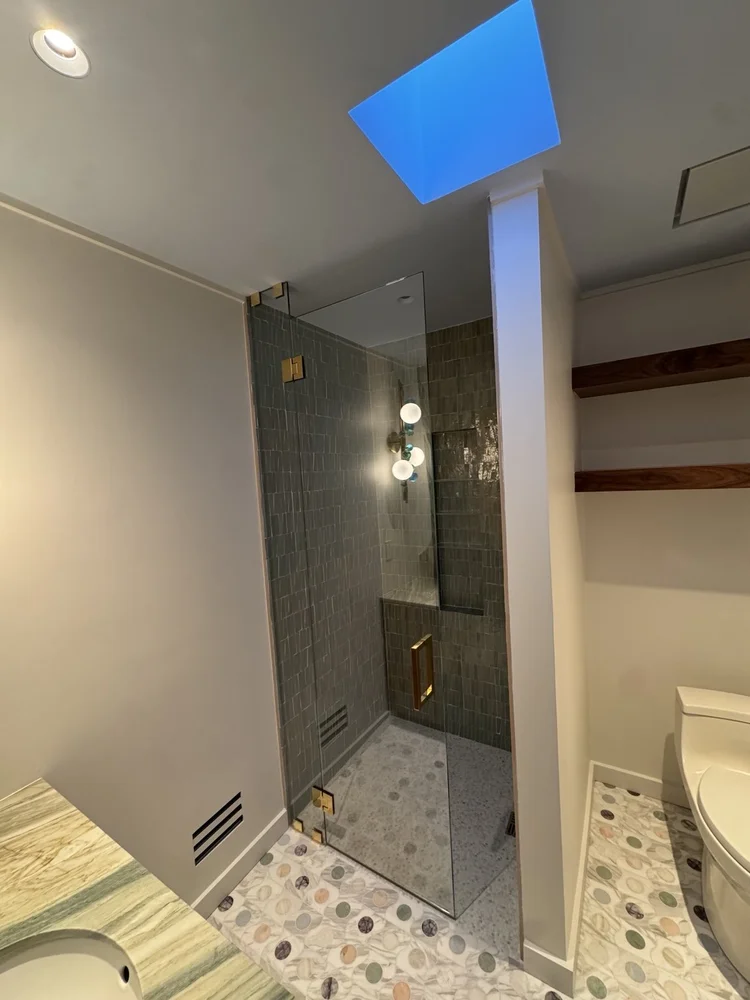 Green tile shower installation — project view.