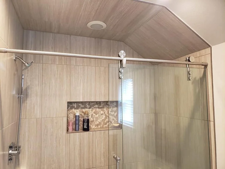 Shower tile and fixture details — EC Construction project photograph.