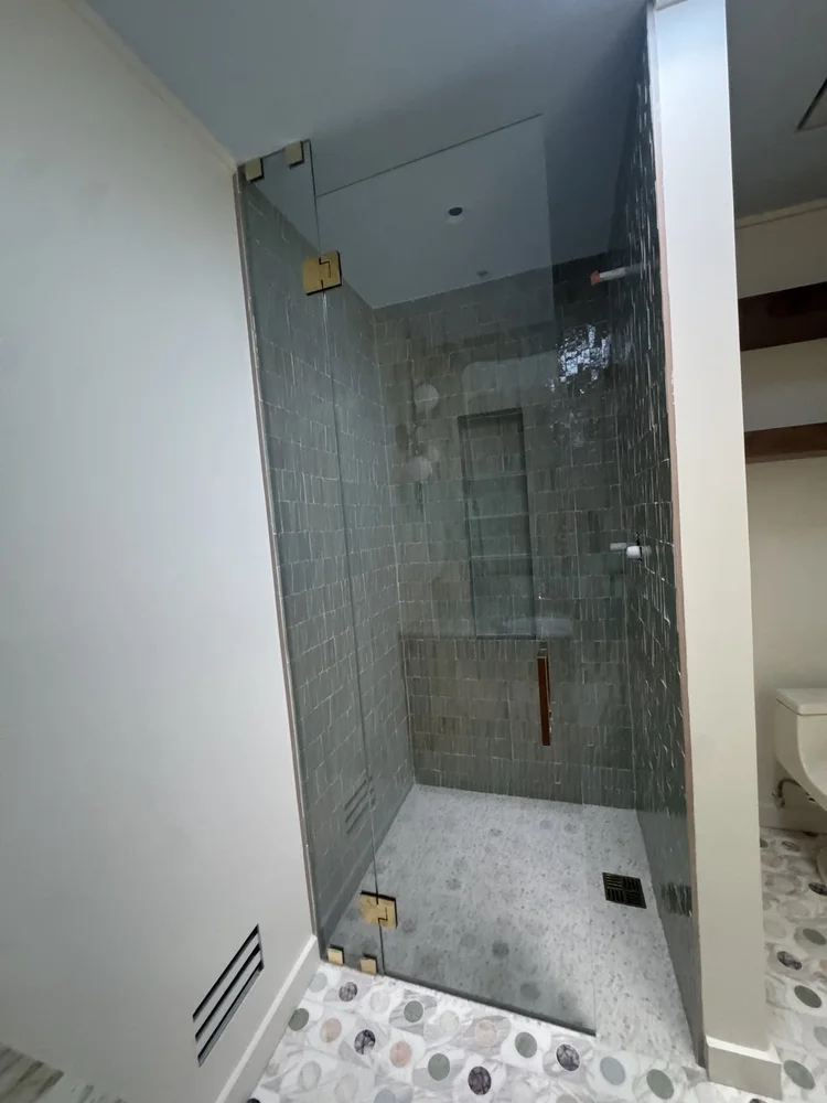 Green tile shower installation — project view.