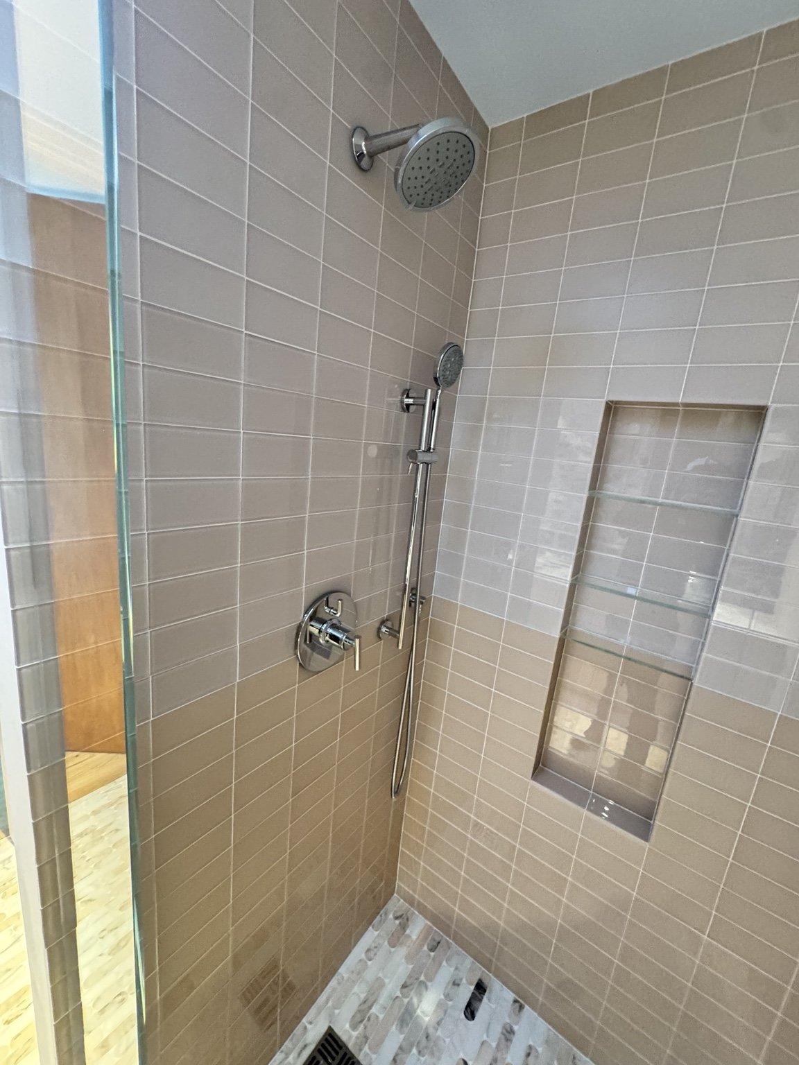 Taupe tile shower — project view.