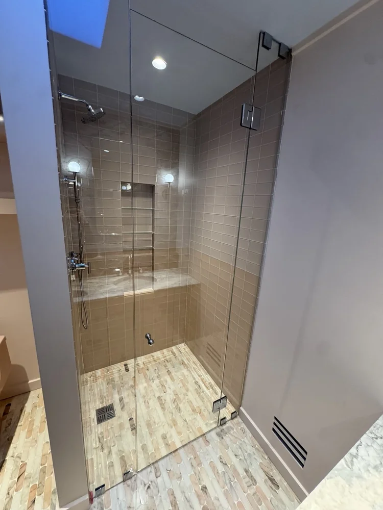 Taupe tile shower — project view.